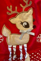 REINDEER WITH STRIPED LEGS AND POLKA DOT PANTS
