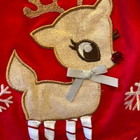 REINDEER WITH STRIPED LEGS AND POLKA DOT PANTS